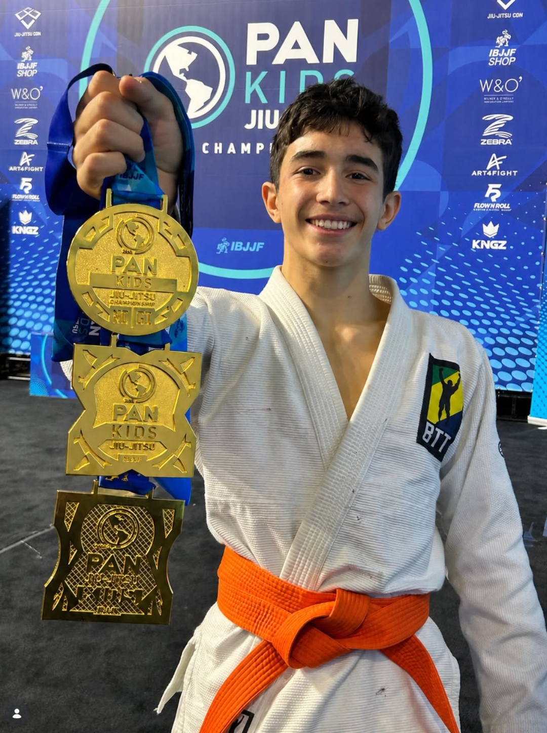 Jayden Portillo with three IBJJF Pan Kids gold medals